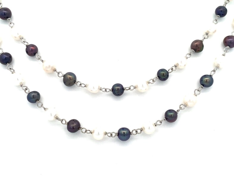 Sterling Silver Freshwater Pearl Necklace Having Alternating Black And White Pearls Measuring 58 Inches
